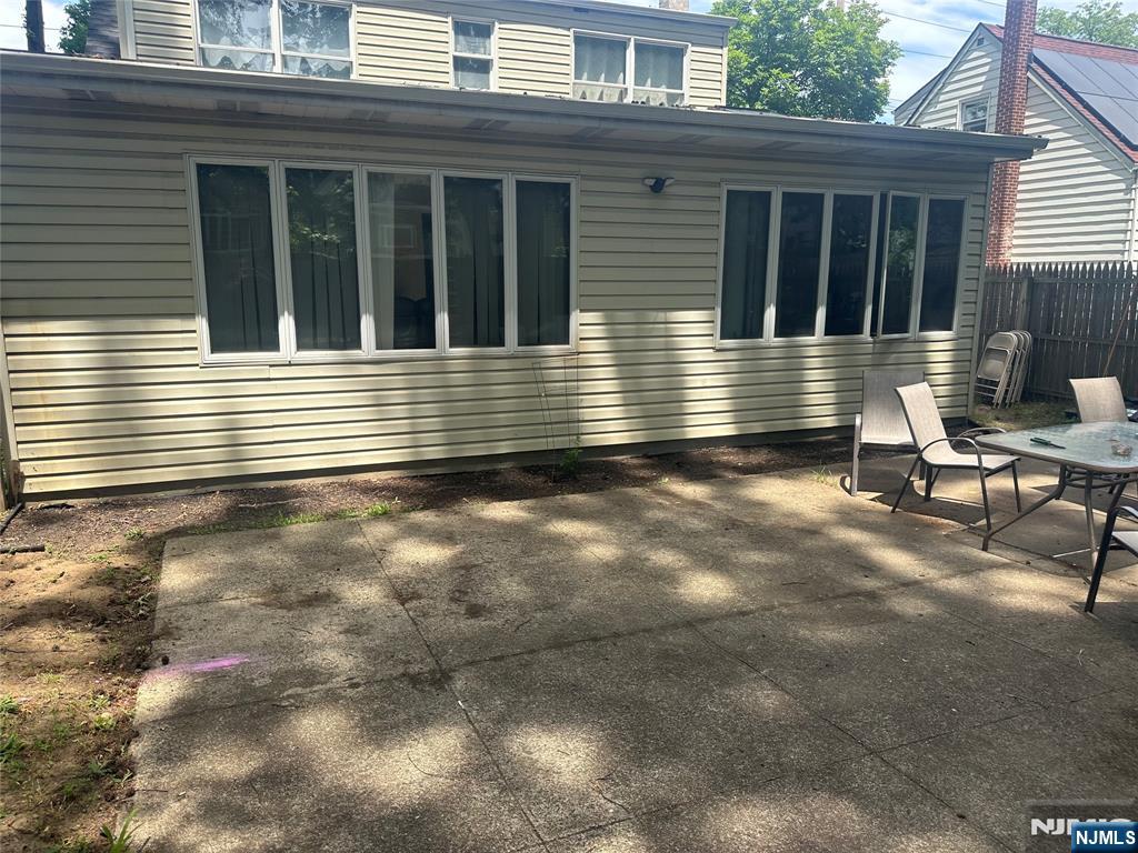 500 New Bridge Road Bergenfield, NJ 07621 - Photo 10 of 10 a view of a house with backyard and sitting area