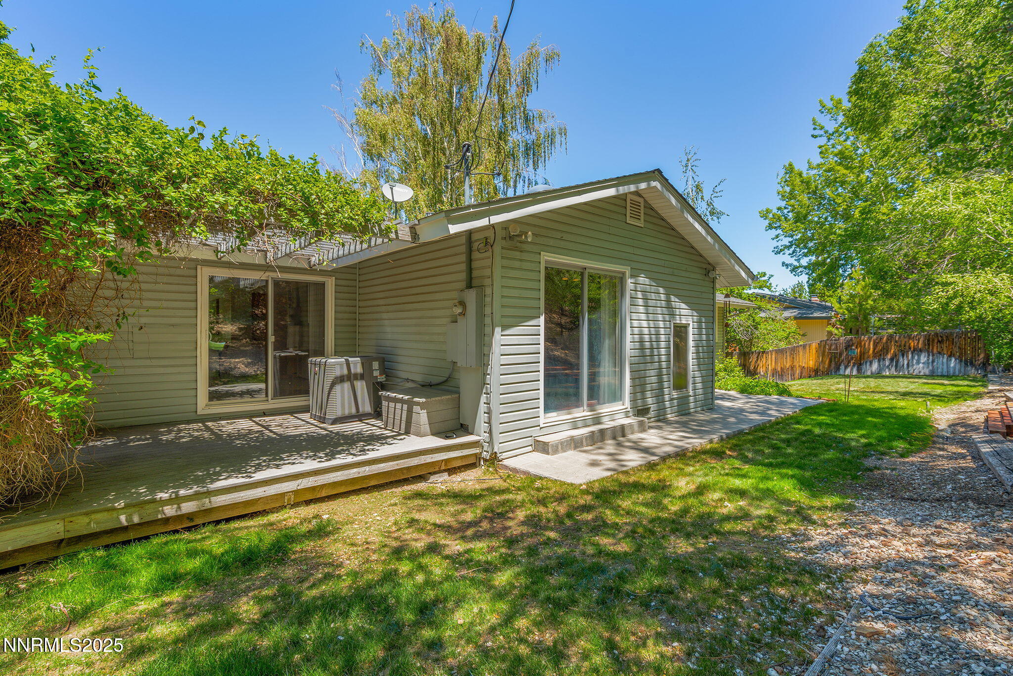 2770 Solari Drive Reno, NV 89509 - Photo 24 of 28 Sliders off of Primary Bed and Bath