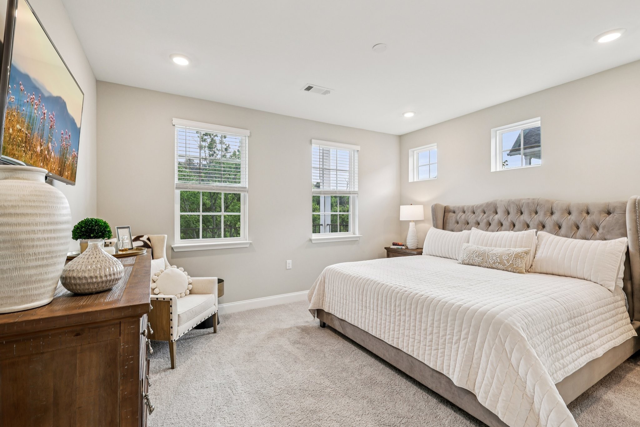 1801 Shadow Green Drive, Unit 306 Franklin, TN 37064 - Photo 13 of 39 a bedroom with a bed and large windows