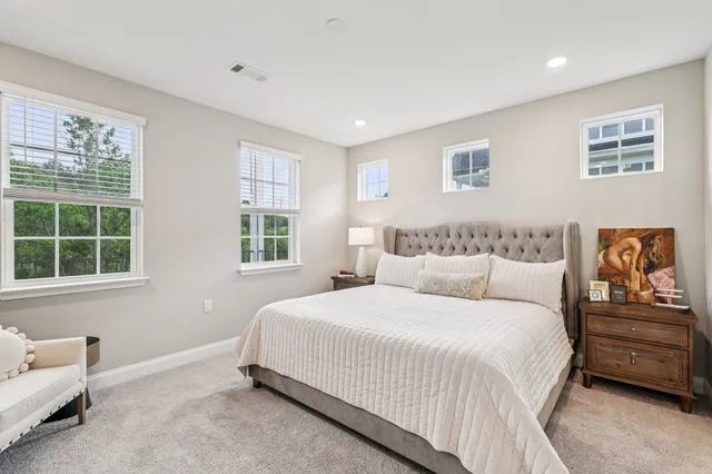 a bathroom with double sink and a mirror