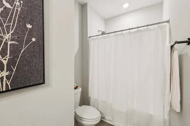 a view of a balcony with furniture