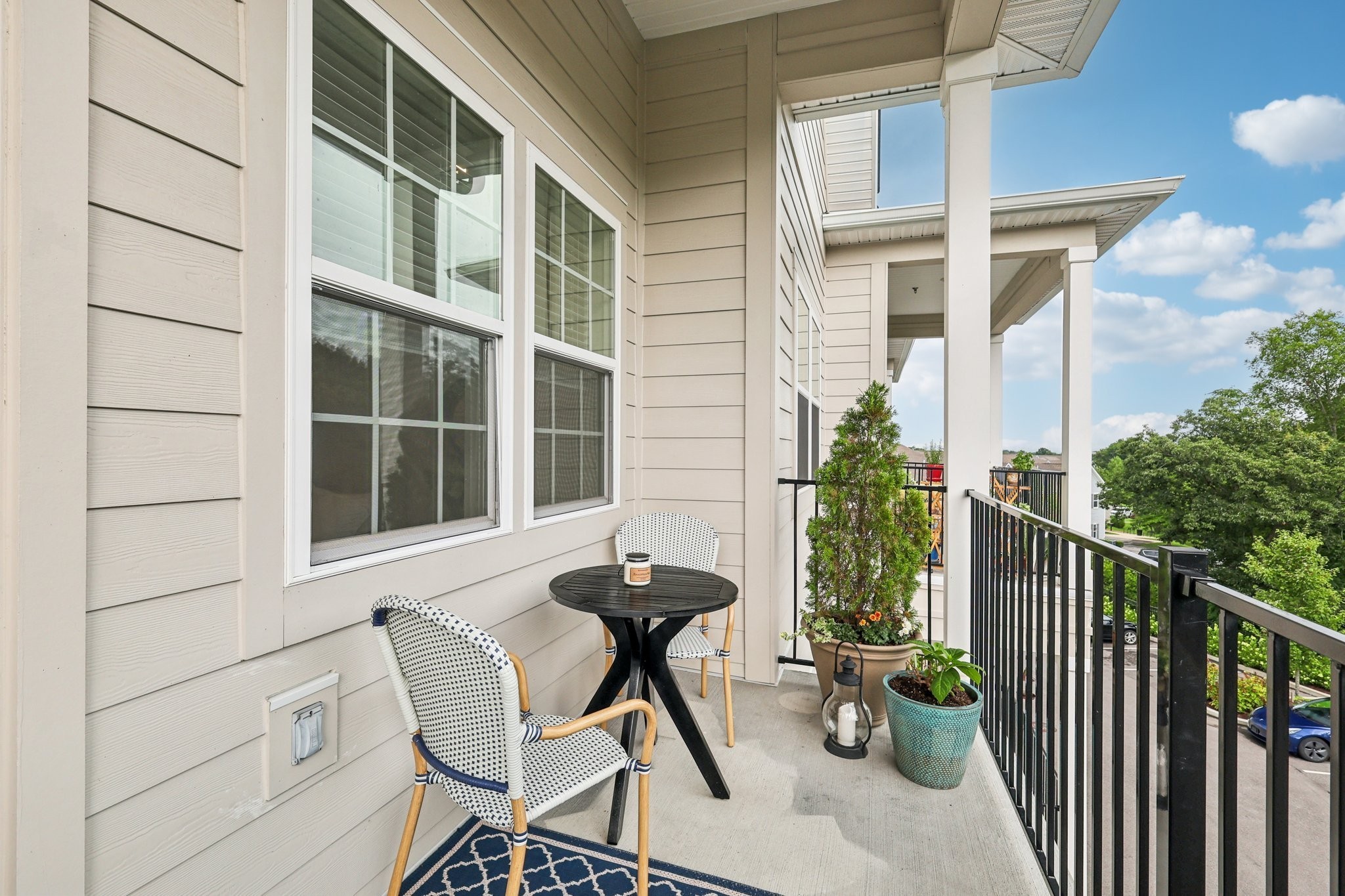 1801 Shadow Green Drive, Unit 306 Franklin, TN 37064 - Photo 33 of 39 a view of a chair and table in the balcony