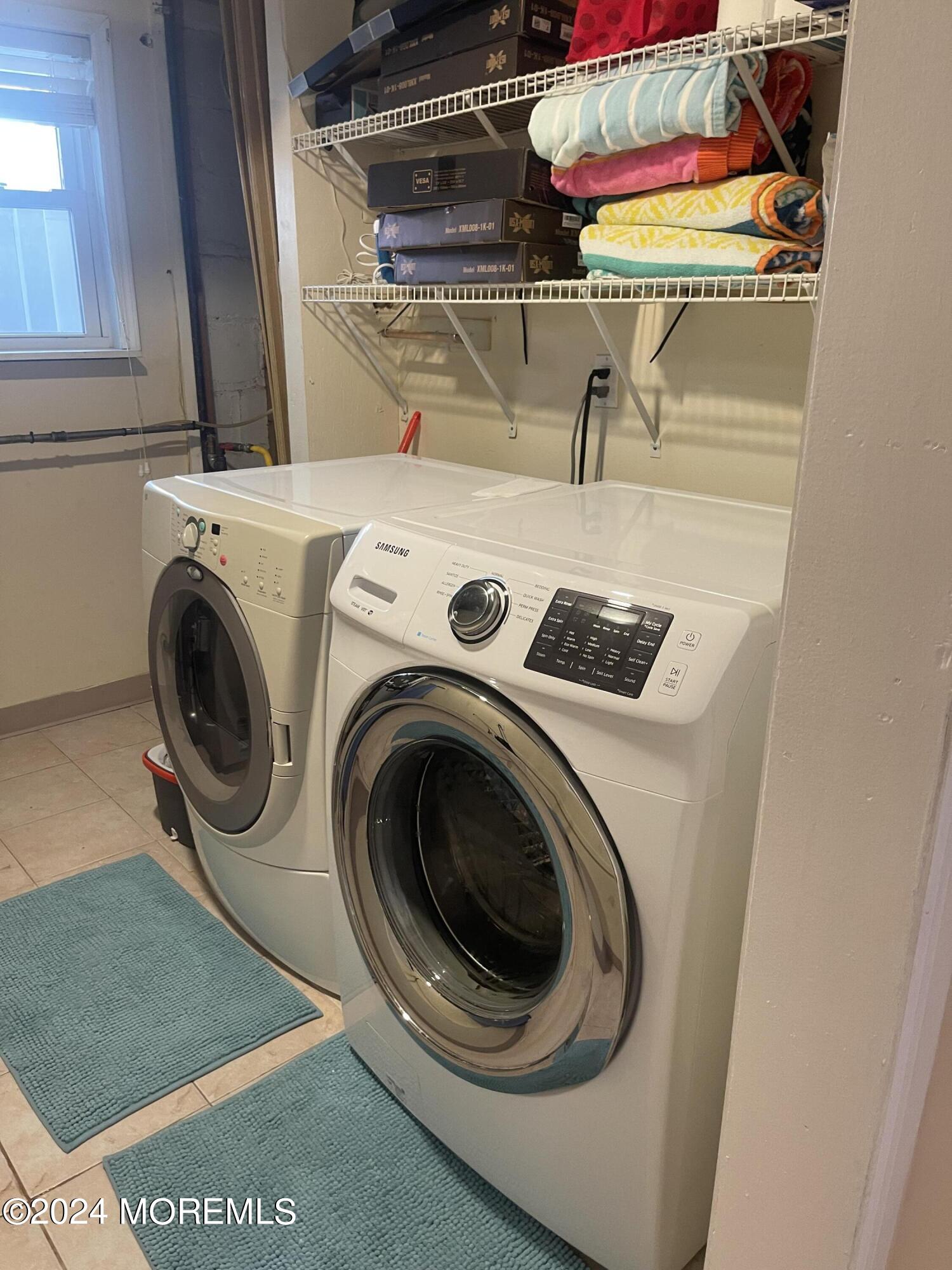 1407 River Road Belmar, NJ 07719 - Photo 23 of 26 a utility room with dryer and washer