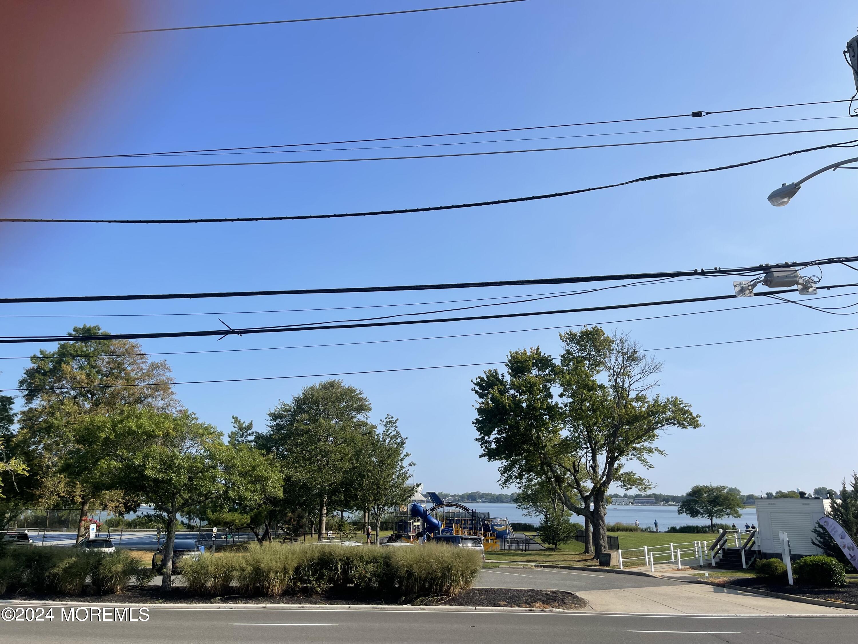 1407 River Road Belmar, NJ 07719 - Photo 24 of 26 a view of a house with a street