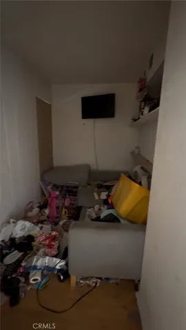 a room with furniture and a flat screen tv