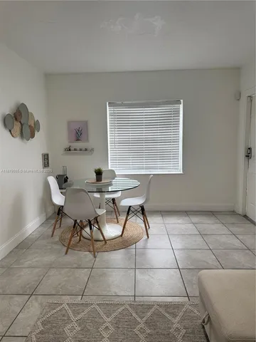 a workspace with furniture and a window