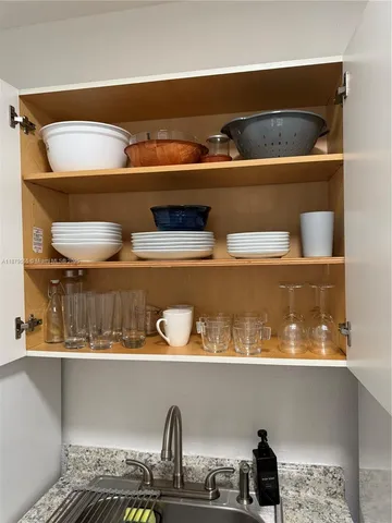 a room with a table and chairs