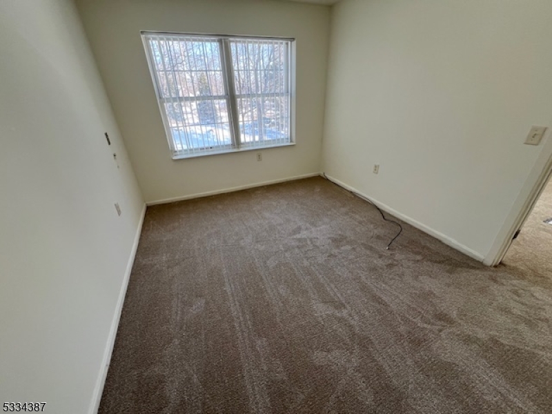 3203 Vail Road Parsippany, NJ 07054 - Photo 11 of 18 an empty room with windows
