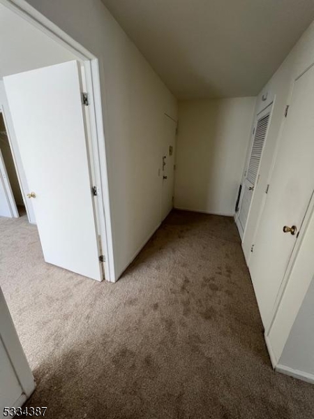 3203 Vail Road Parsippany, NJ 07054 - Photo 3 of 18 an empty room with windows