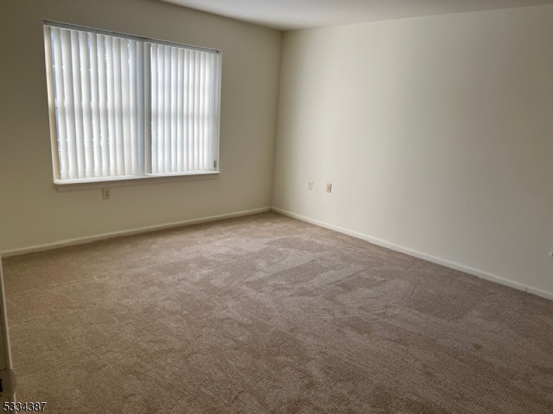 3203 Vail Road Parsippany, NJ 07054 - Photo 7 of 18 an empty room with a window