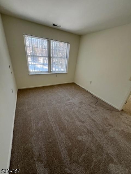 3203 Vail Road Parsippany, NJ 07054 - Photo 10 of 18 an empty room with windows