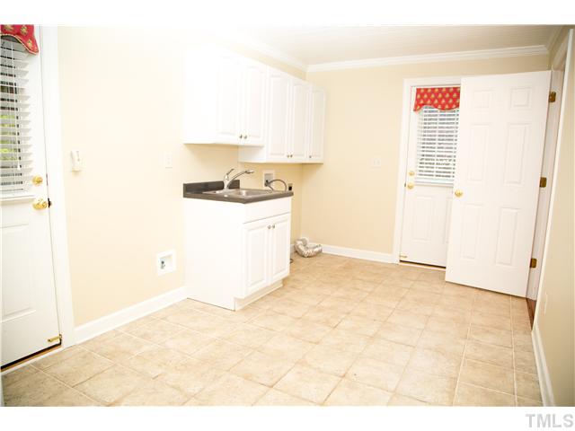 4809 Poland Place Raleigh, NC 27609 - Photo 10 of 25 a view of a kitchen with a sink