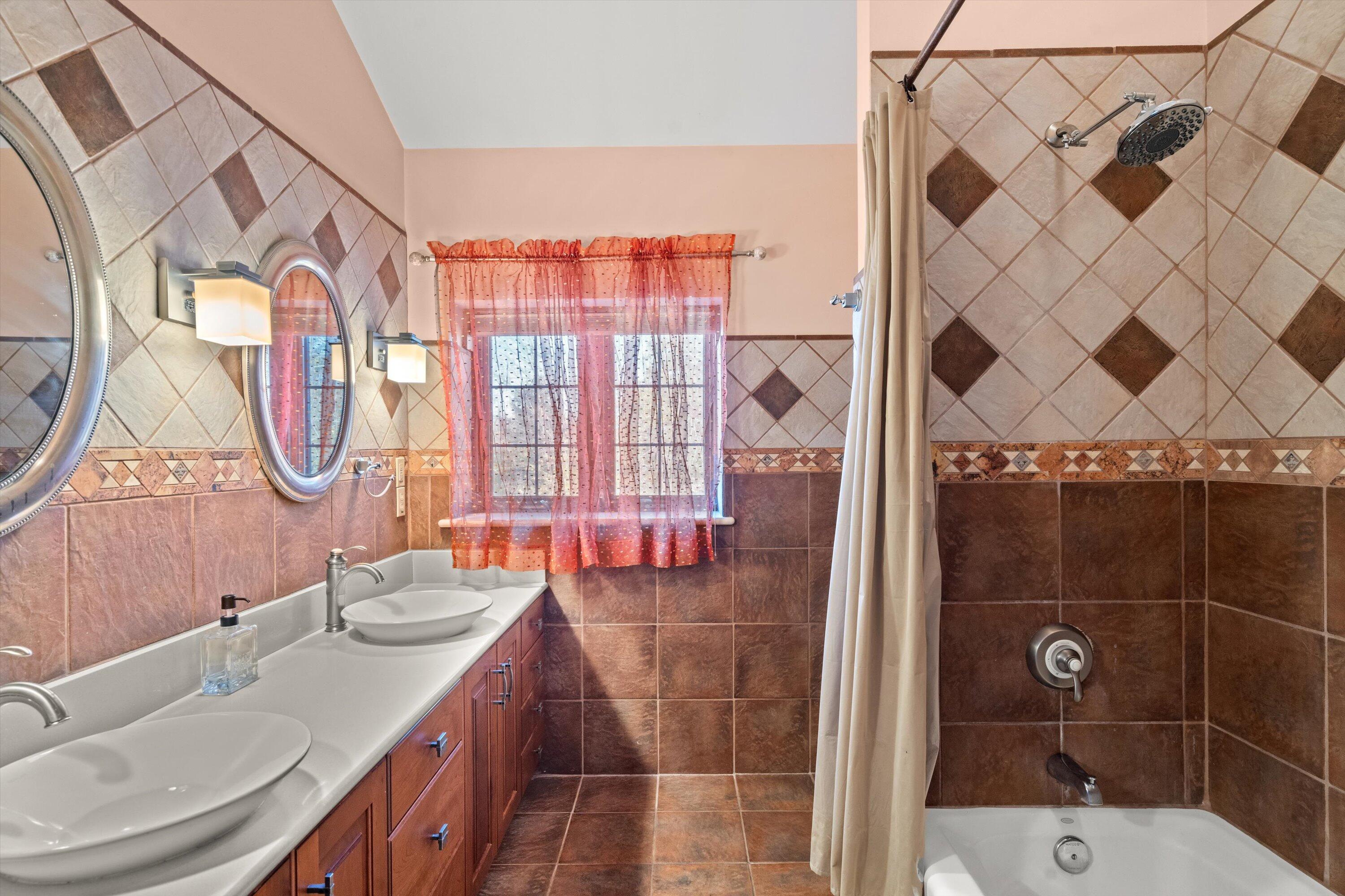 N44W25902 Lindsay Road Pewaukee, WI 53072 - Photo 36 of 92 Upper Level Main Bathroom with Custom Tile Work