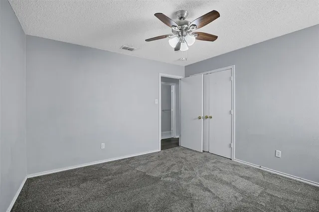 a view of a backyard with a garden