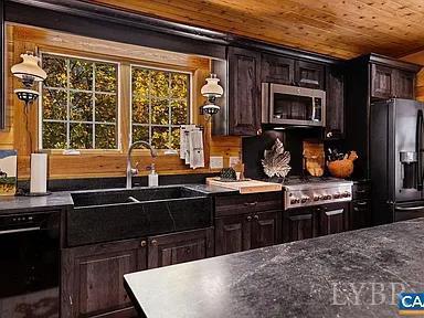 325 Old Roseland Road Roseland, VA 22967 - Photo 42 of 69 a kitchen with a sink stove and refrigerator