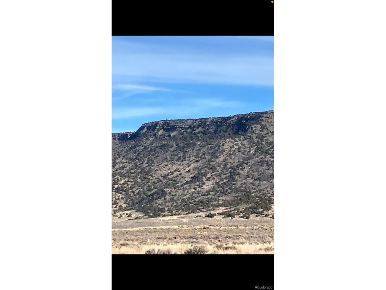 73 Old Stage Coach Road San Luis, CO 81152 - Photo 6 of 13 a picture of a bench in middle of the room