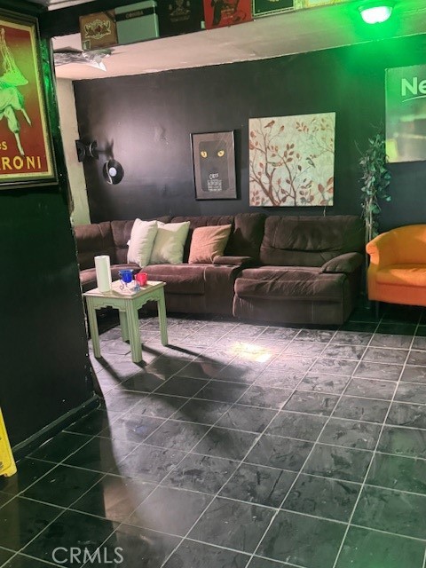 165 East O Grand Terrace, CA 92313 - Photo 11 of 17 a living room with furniture and a flat screen tv