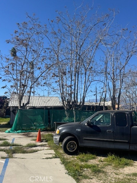 165 East O Grand Terrace, CA 92313 - Photo 13 of 17 a front view of a house with a garden