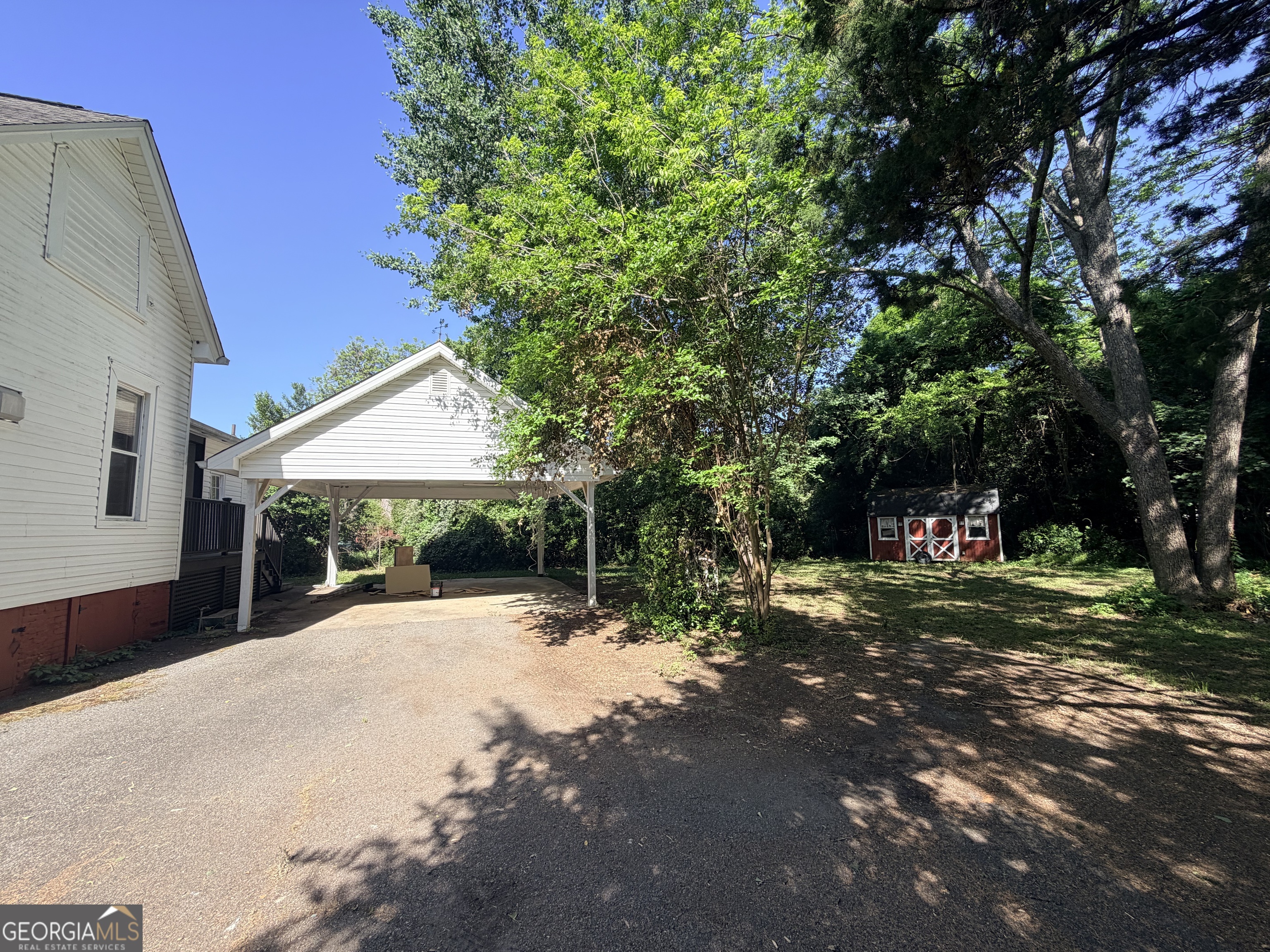 316 West Church Street Fort Valley, GA 31030 - Photo 6 of 28 a view of a house with a yard and tree s