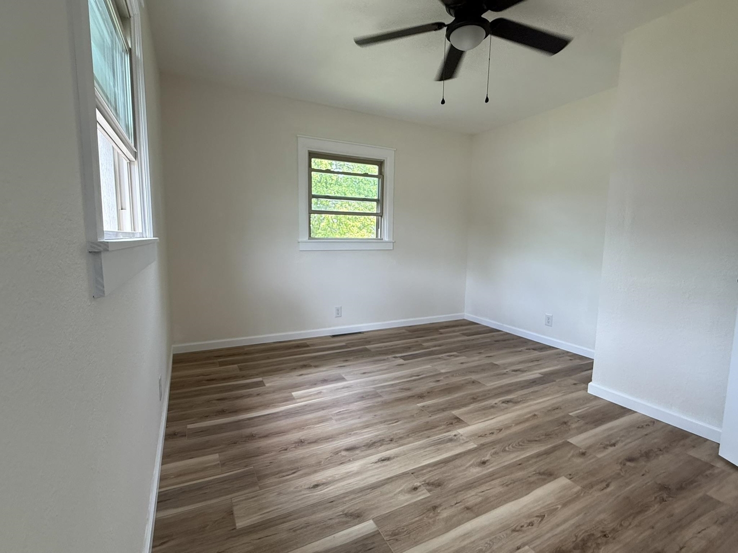1103 West 10th Street Metropolis, IL 62960 - Photo 21 of 32 a view of empty room with ceiling fan