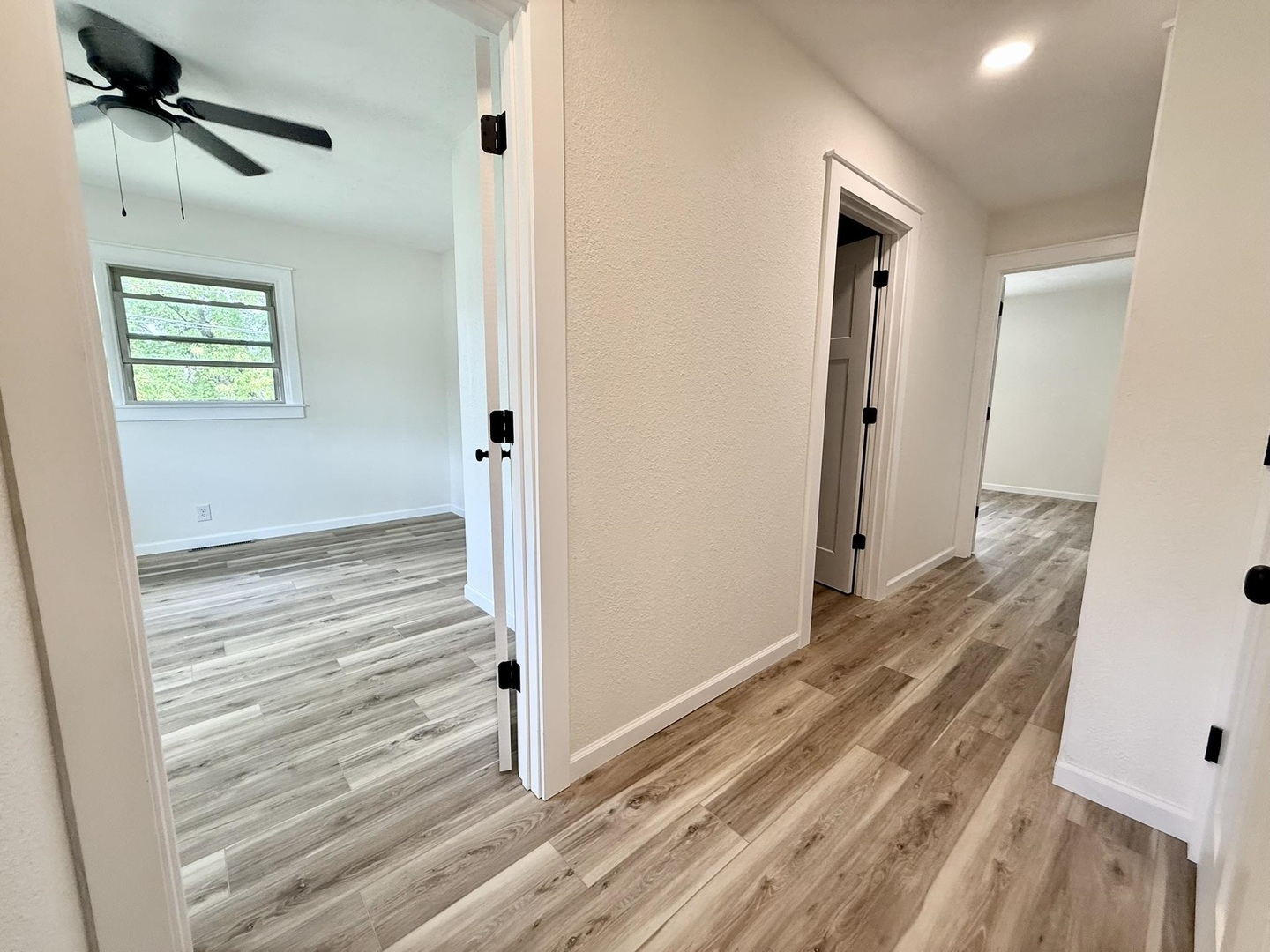 1103 West 10th Street Metropolis, IL 62960 - Photo 26 of 32 a view of a hallway with wooden floor and staircase