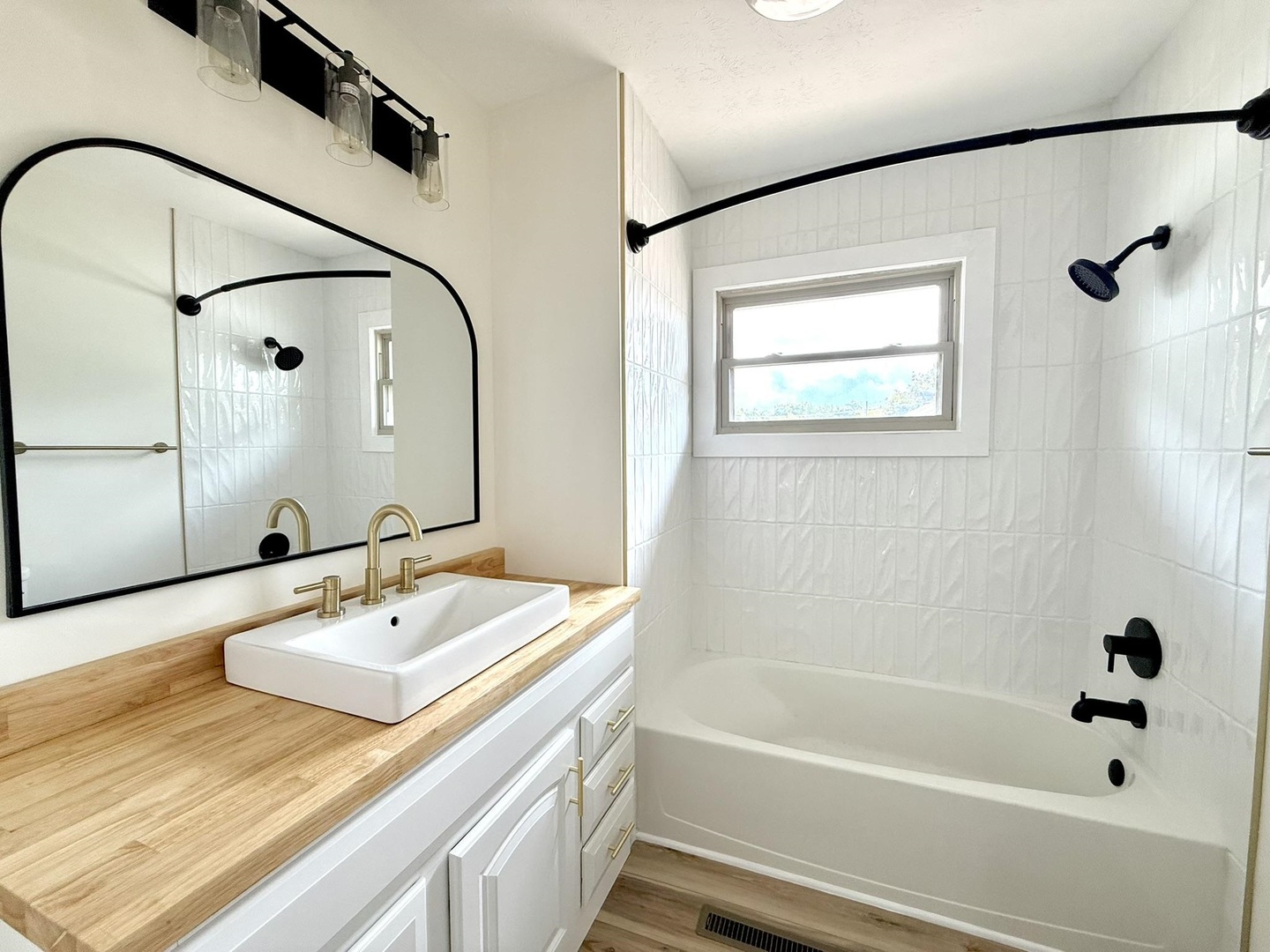 1103 West 10th Street Metropolis, IL 62960 - Photo 28 of 32 a bathroom with a sink and a mirror