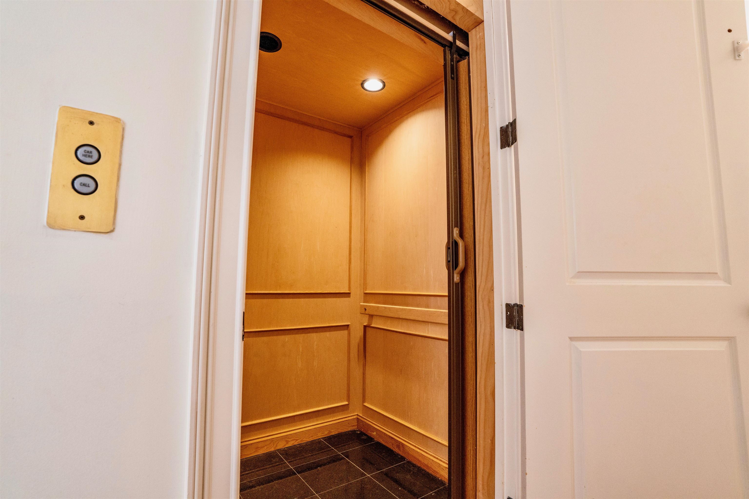 205 Jamerson Farm Road Collierville, TN 38017 - Photo 27 of 33 Interior details featuring tile patterned flooring and elevator