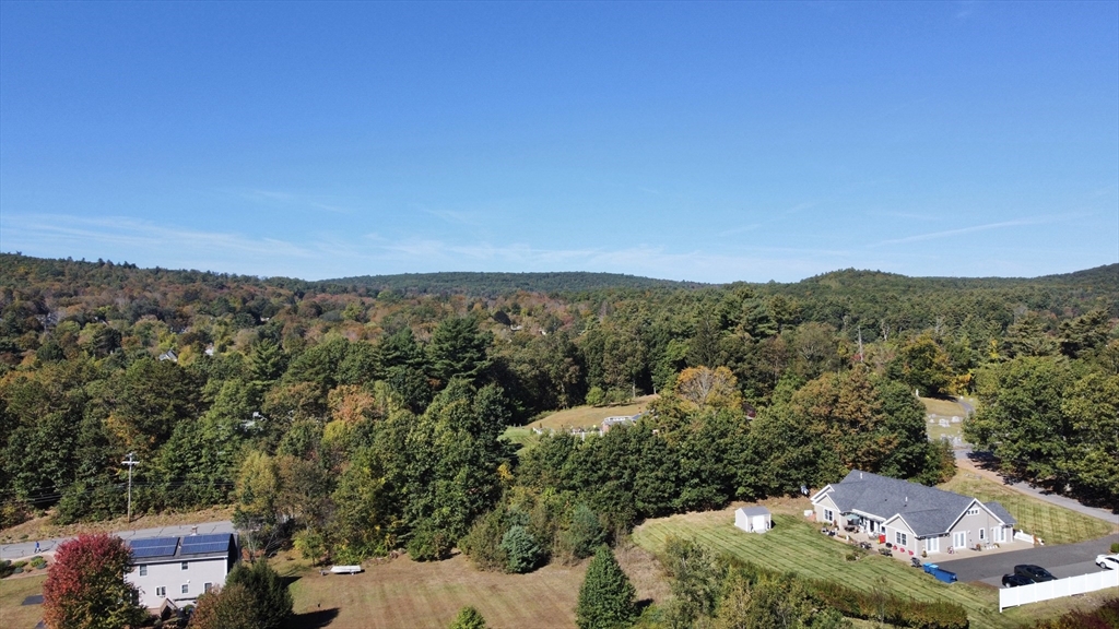 0 Bethany Road Monson, MA 01057 - Photo 4 of 5 an aerial view of a house with mountain view