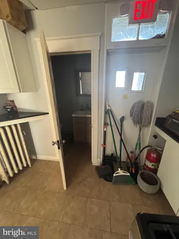 a view of utility room and living room