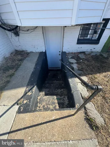 a view of an entryway with hallway