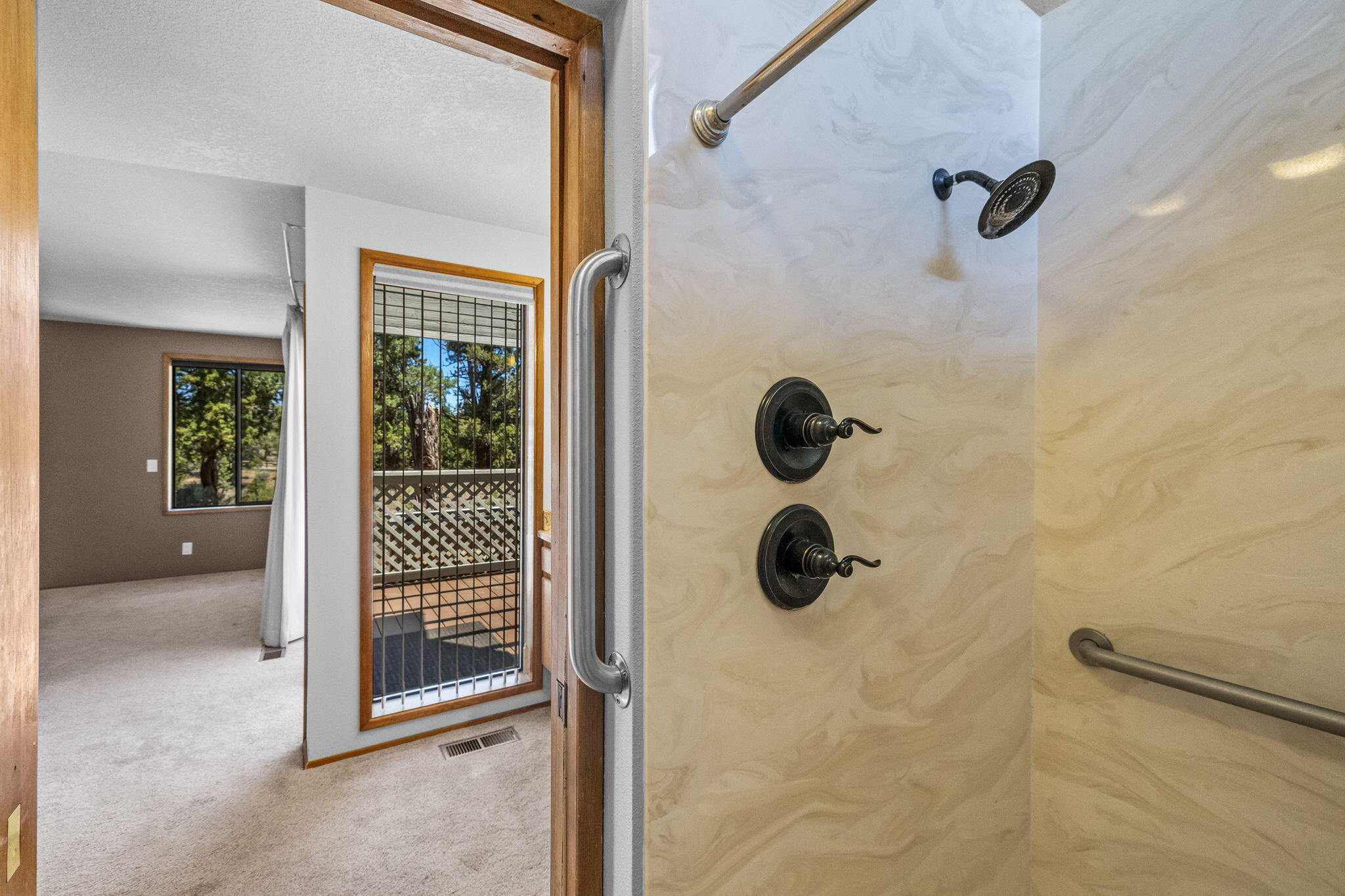 64586 McGrath Road Bend, OR 97701 - Photo 14 of 27 a bathroom with a shower