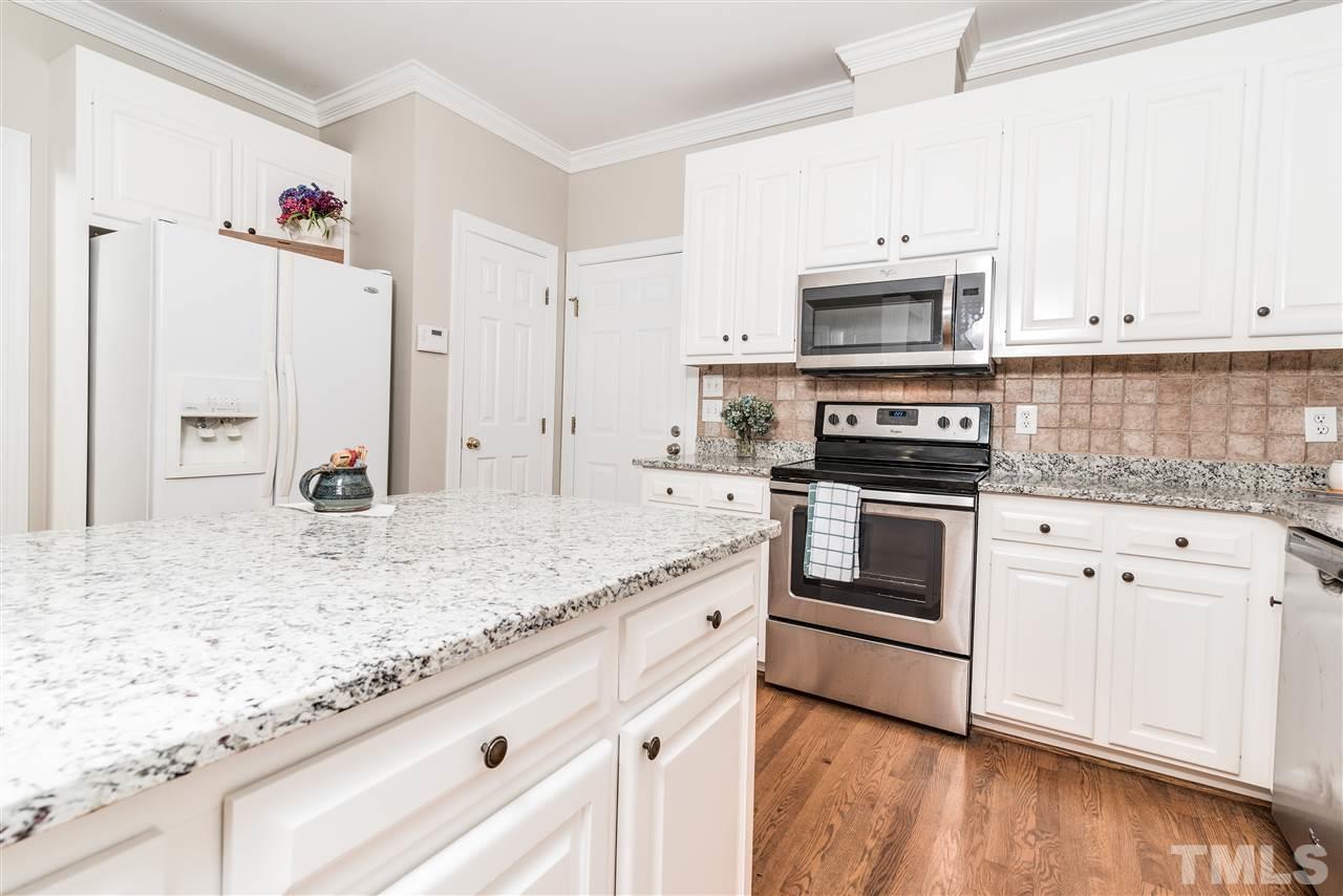 6101 Hampton Ridge Road Raleigh, NC 27603 - Photo 10 of 25 Tumbled tile backsplash