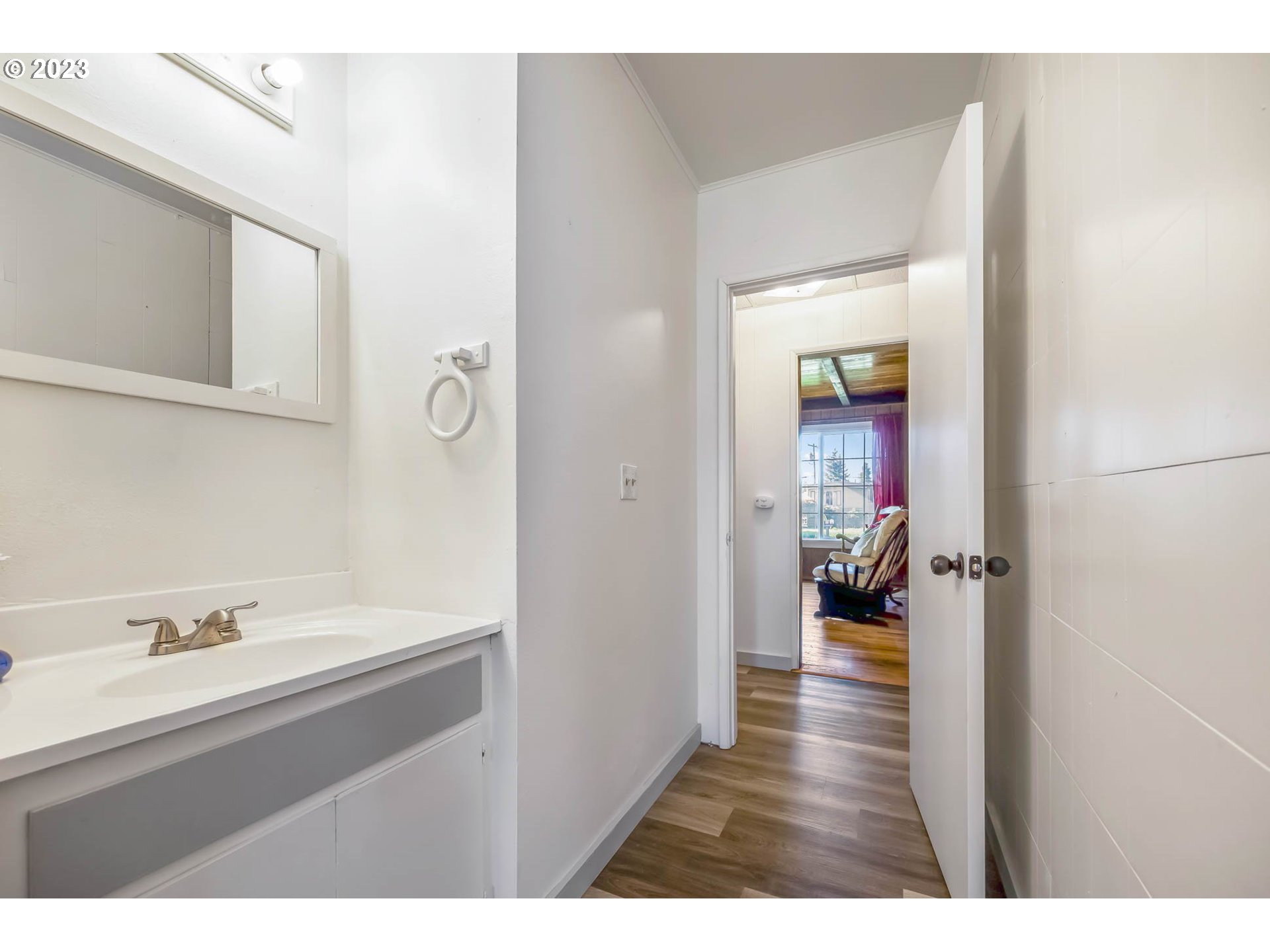 1565 Laura Street Springfield, OR 97477 - Photo 29 of 40 a bathroom with a sink and mirror