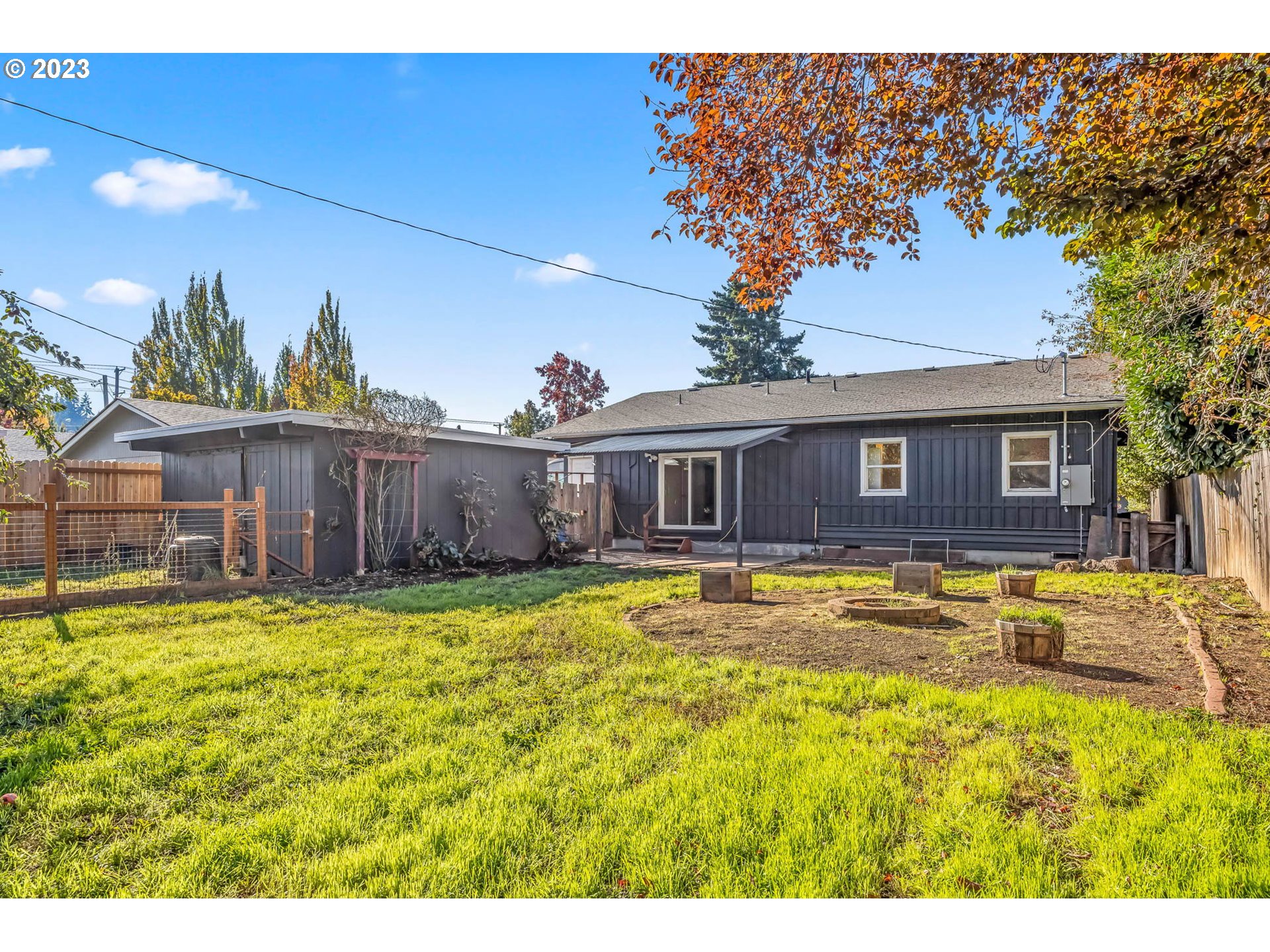 1565 Laura Street Springfield, OR 97477 - Photo 35 of 40 a view of a house with a swimming pool