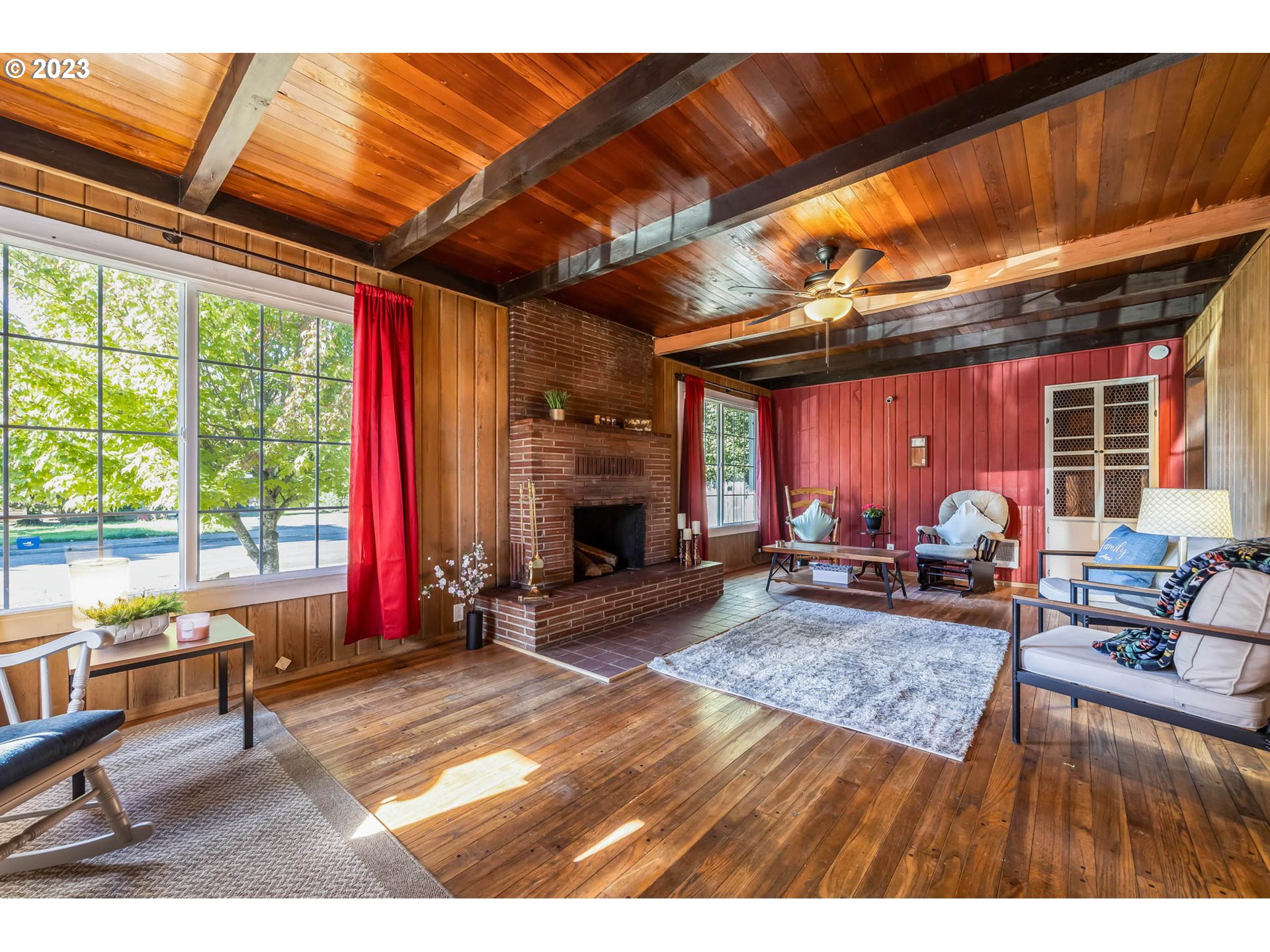 1565 Laura Street Springfield, OR 97477 - Photo 4 of 40 a view of a room with wooden floor and outdoor seating