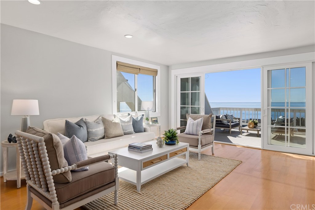 708 Cliff Drive Laguna Beach, CA 92651 - Photo 13 of 19 a living room with furniture and a table
