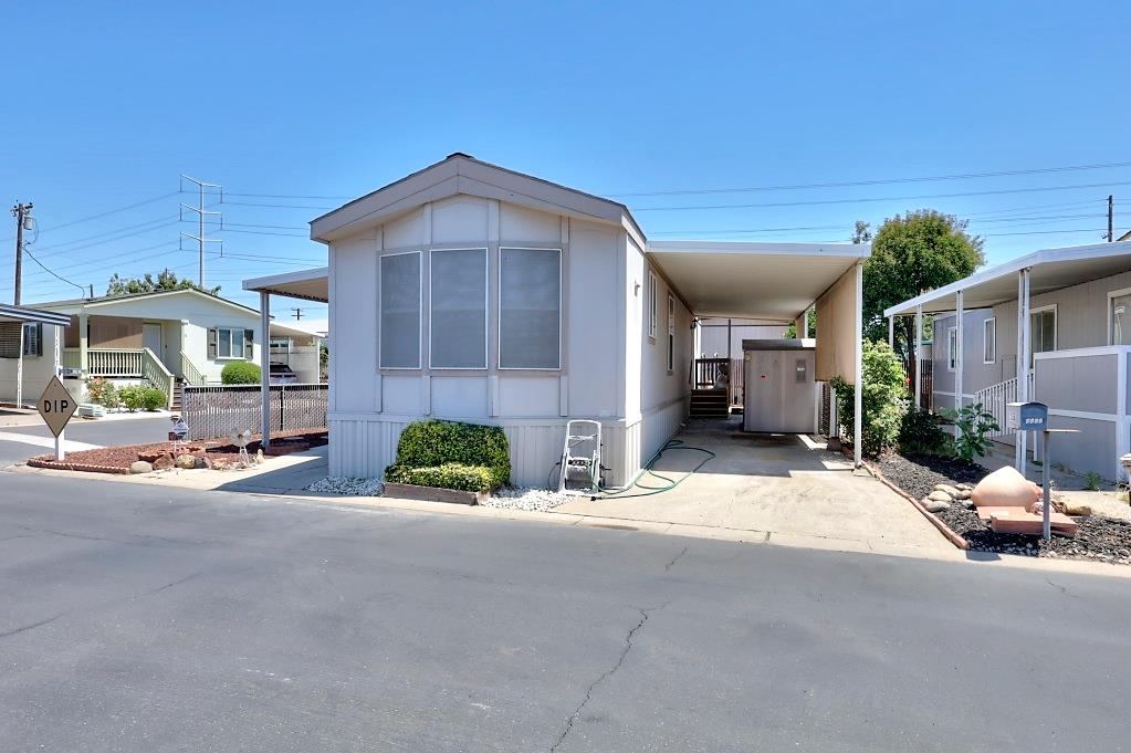 3506 Homestead Way Ceres, CA 95307 - Photo 26 of 39 a view of a house with a street