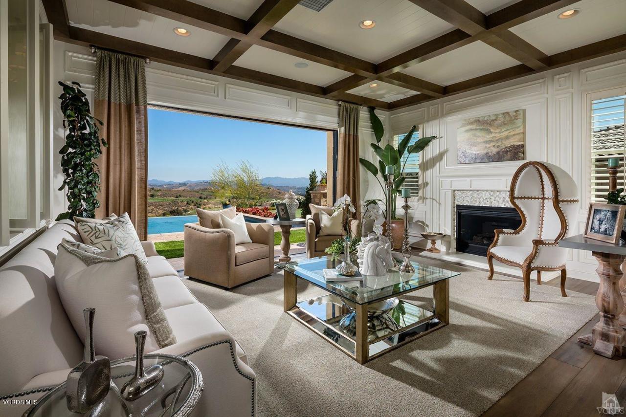 7334 Augusta Drive Moorpark, CA 93021 - Photo 5 of 13 a living room with furniture and a fireplace