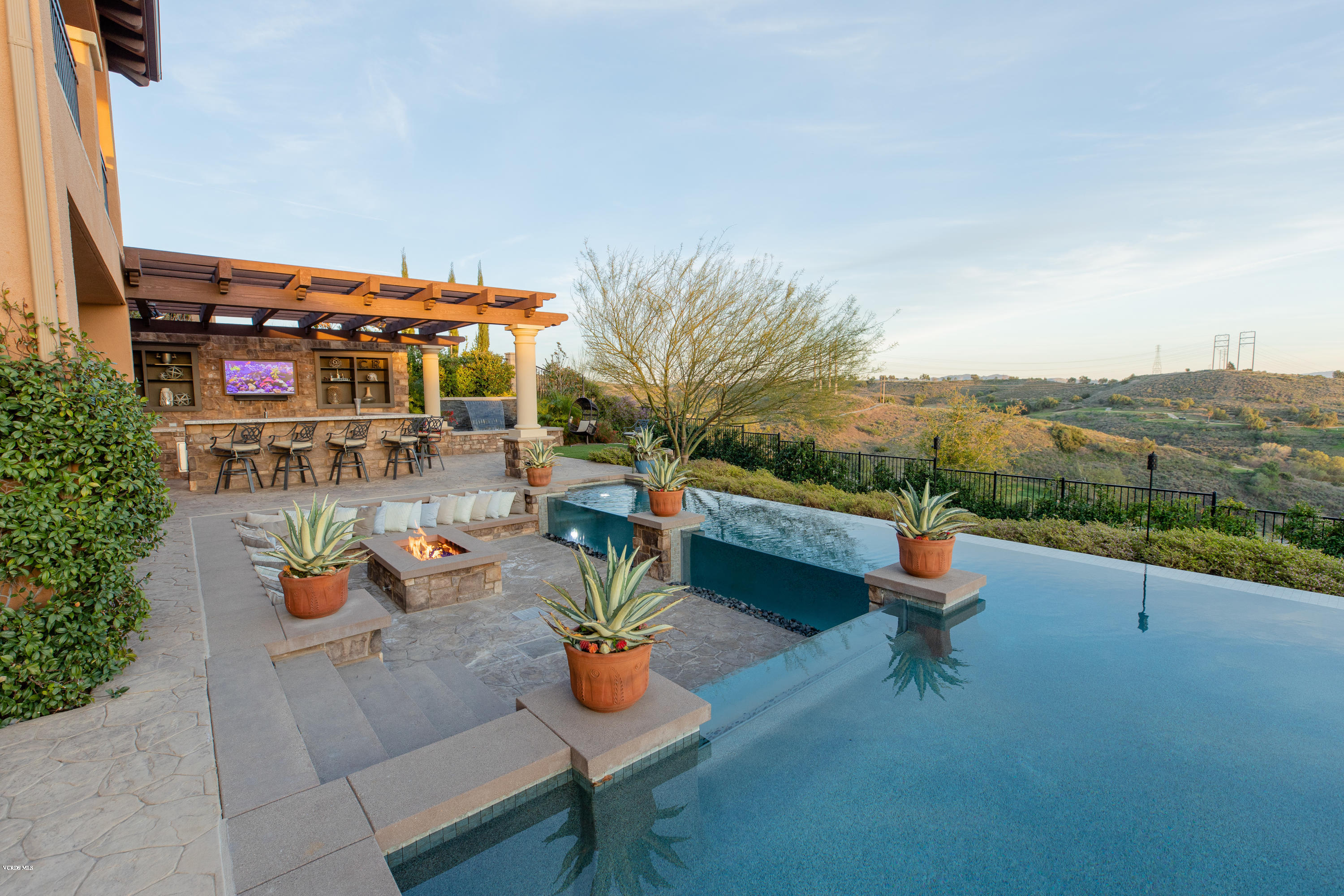7334 Augusta Drive Moorpark, CA 93021 - Photo 7 of 13 an outdoor sitting area with furniture and city view