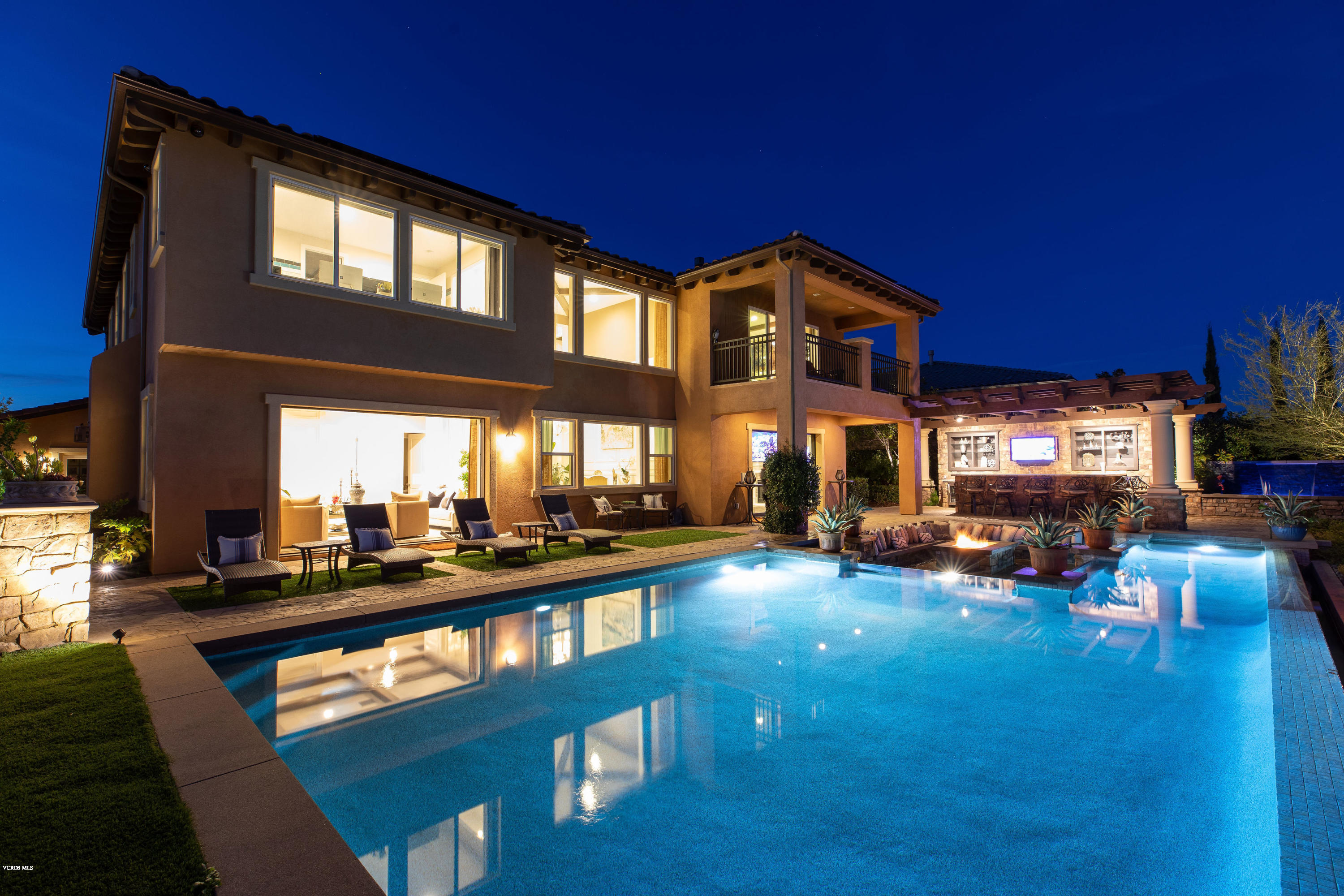 7334 Augusta Drive Moorpark, CA 93021 - Photo 10 of 13 a view of a house with swimming pool and sitting area
