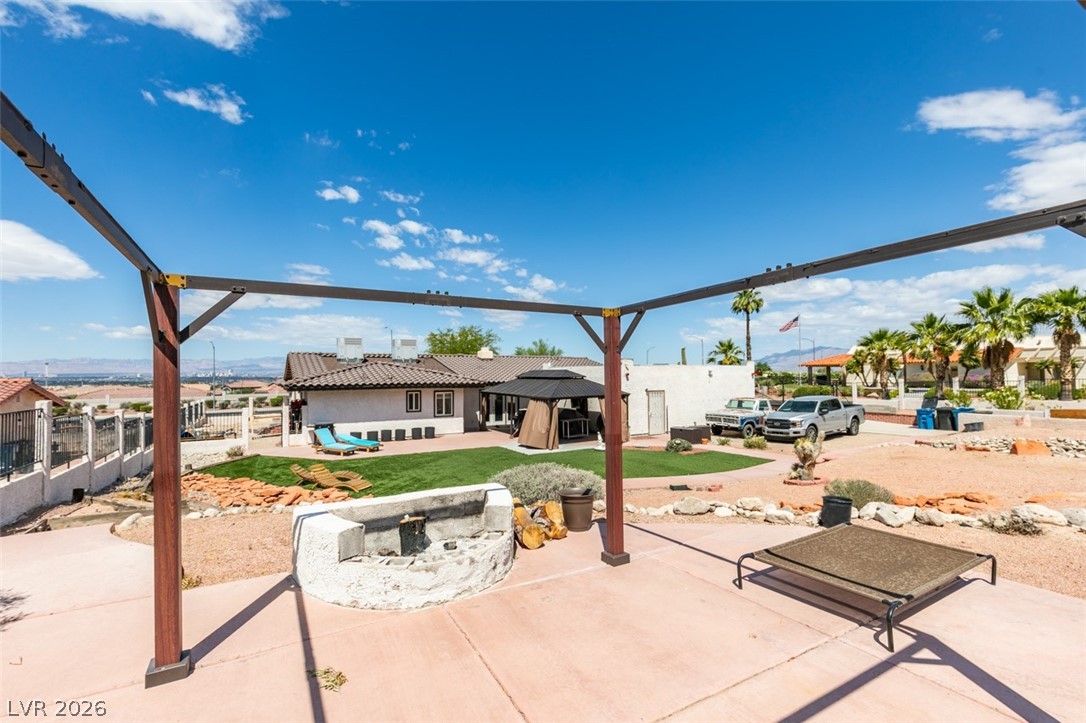 892 North Hollywood Boulevard Las Vegas, NV 89110 - Photo 51 of 81 This desert oasis features a spacious yard, inviting patio, and stunning panoramic views.