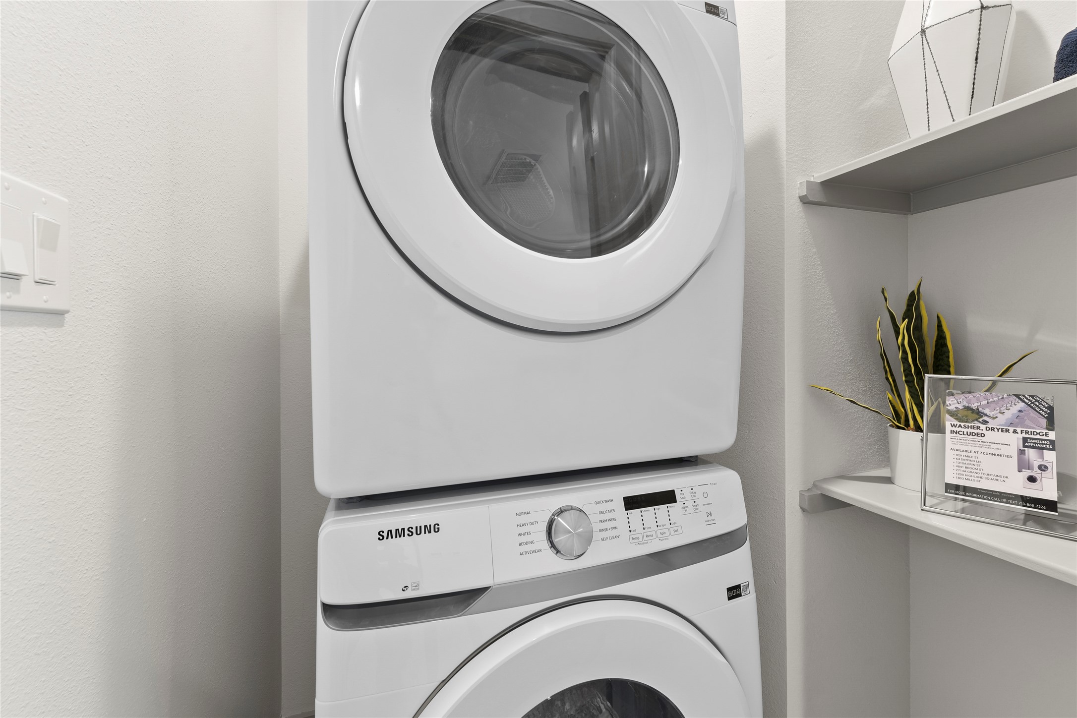 64 Dipping Lane Houston, TX 77076 - Photo 7 of 17 a utility room with dryer and washer