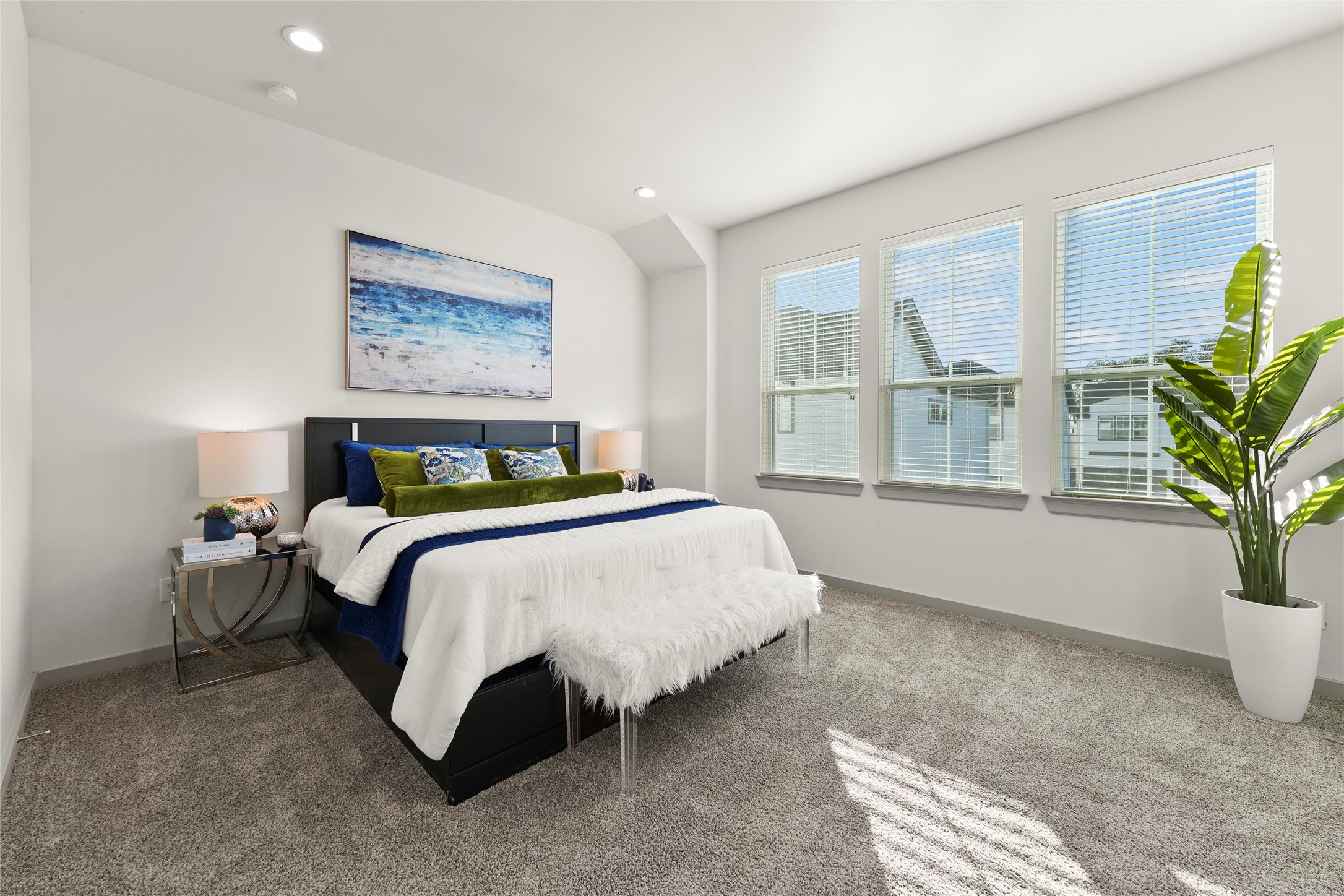 64 Dipping Lane Houston, TX 77076 - Photo 8 of 17 a bed sitting in a spacious bedroom next to a window