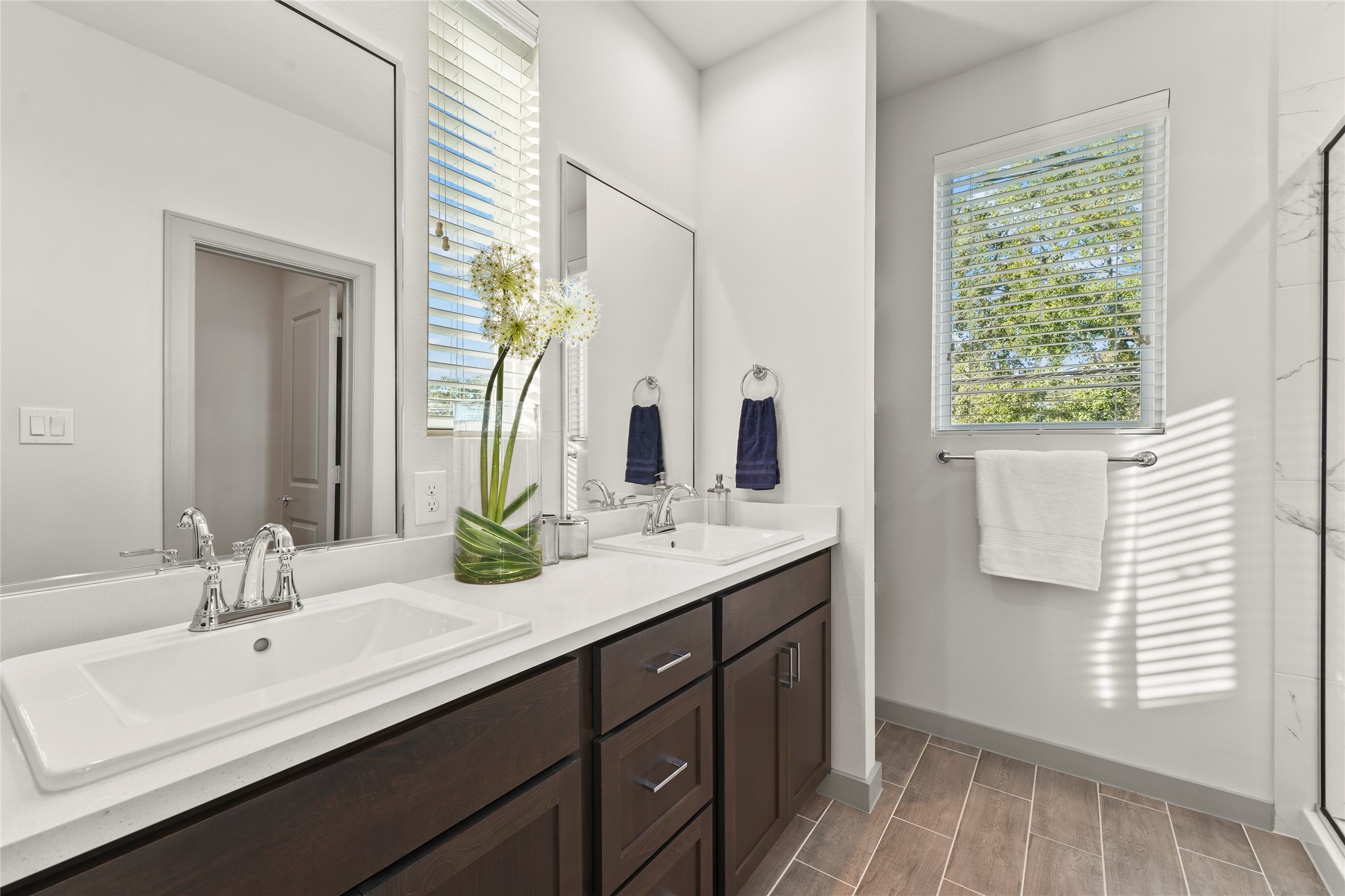 64 Dipping Lane Houston, TX 77076 - Photo 10 of 17 a bathroom with a double vanity sink and a mirror