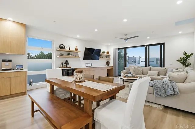 a living room with fireplace furniture and a flat screen tv