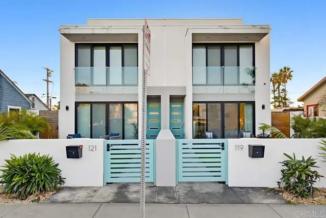 a view of a brick house with a large windows