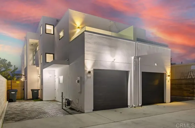 a bathroom with a glass door shower