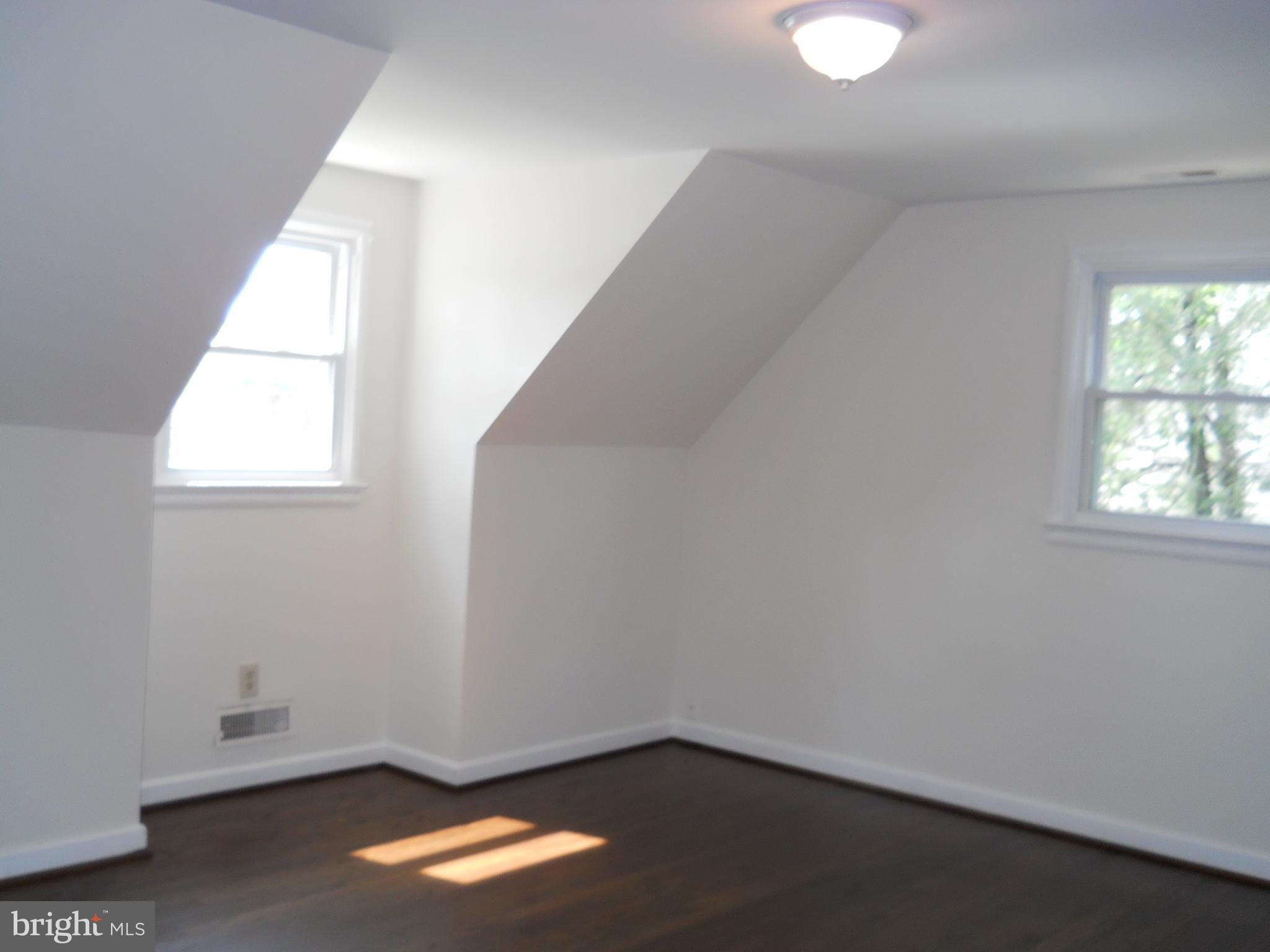 12607 Dean Road Silver Spring, MD 20906 - Photo 17 of 34 an empty room with a window