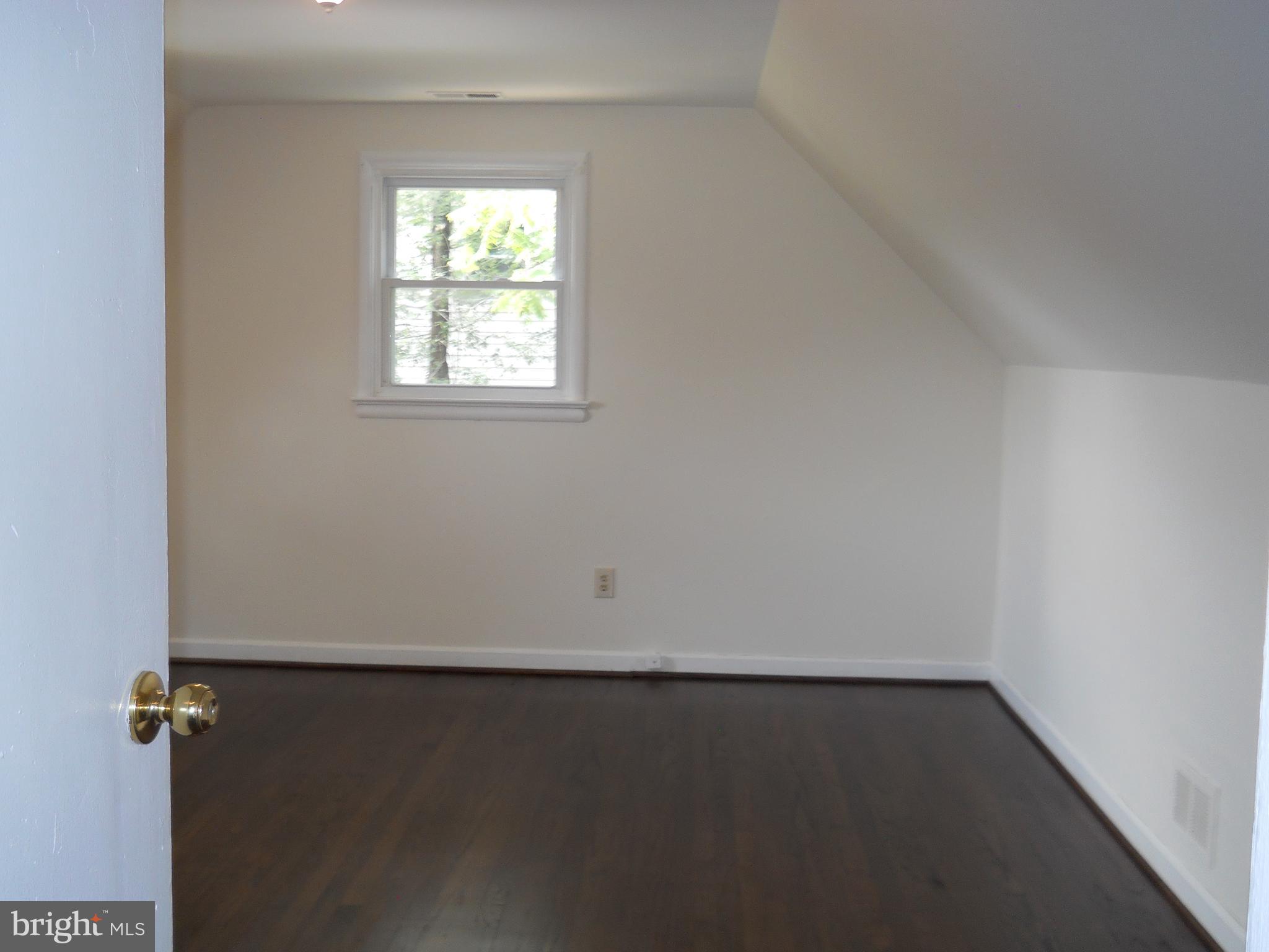 12607 Dean Road Silver Spring, MD 20906 - Photo 18 of 34 an empty room with a window