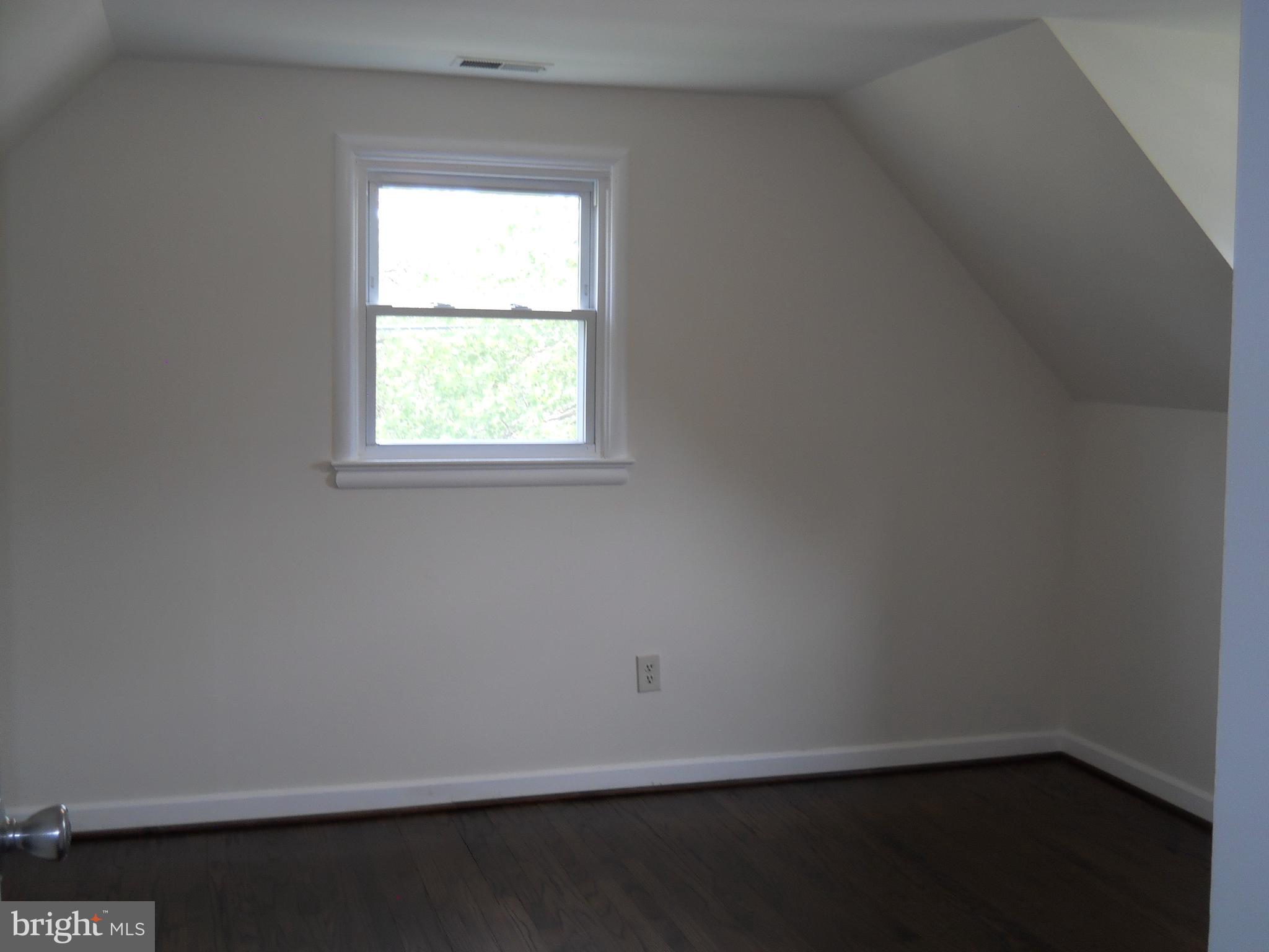 12607 Dean Road Silver Spring, MD 20906 - Photo 21 of 34 an empty room with a window